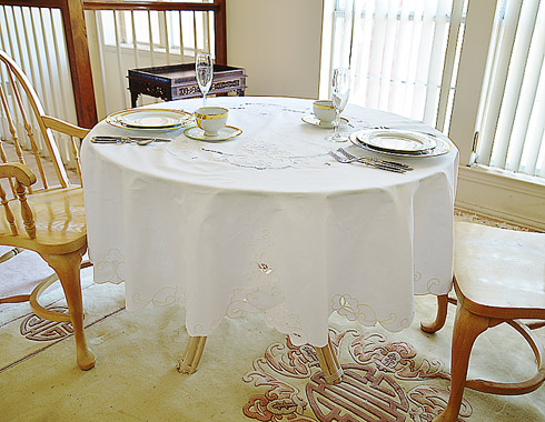 Imperial fine embroidery round tablecloth. 68" x 68" Round.